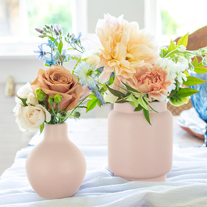 https://bloomtownflowermarket.com/wp-content/uploads/2022/05/8165-15-1226-mod-bauble-ceramic-bud-vases-feature-2_675x675_crop_center.jpg